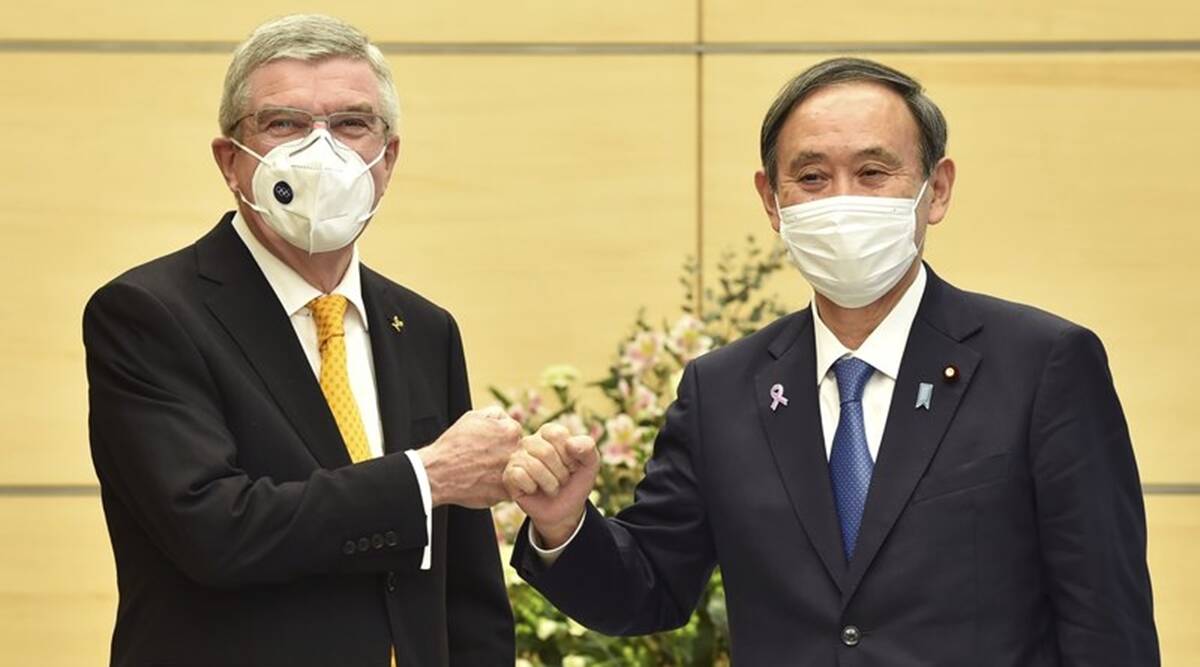 IOC President Thomas Bach with Japan Prime Minister Yoshihide Suga.