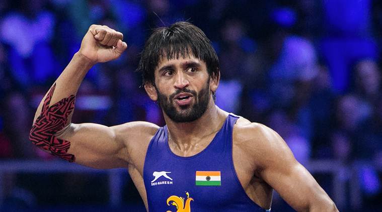 Bajrang Punia celebrates after his gold medal clinch at Commonwealth Games 2018.