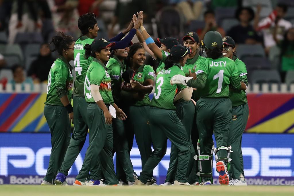 Bangladesh players celebrate after effecting a dismissal.