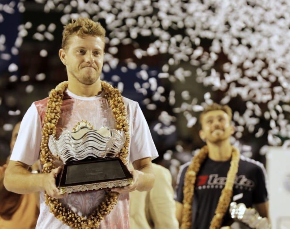 James Duckworth poses with the Bengaluru Open men's singles trophy.