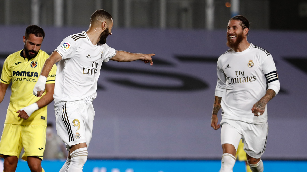 Karim Benzema celebrates after scoring  a goal.