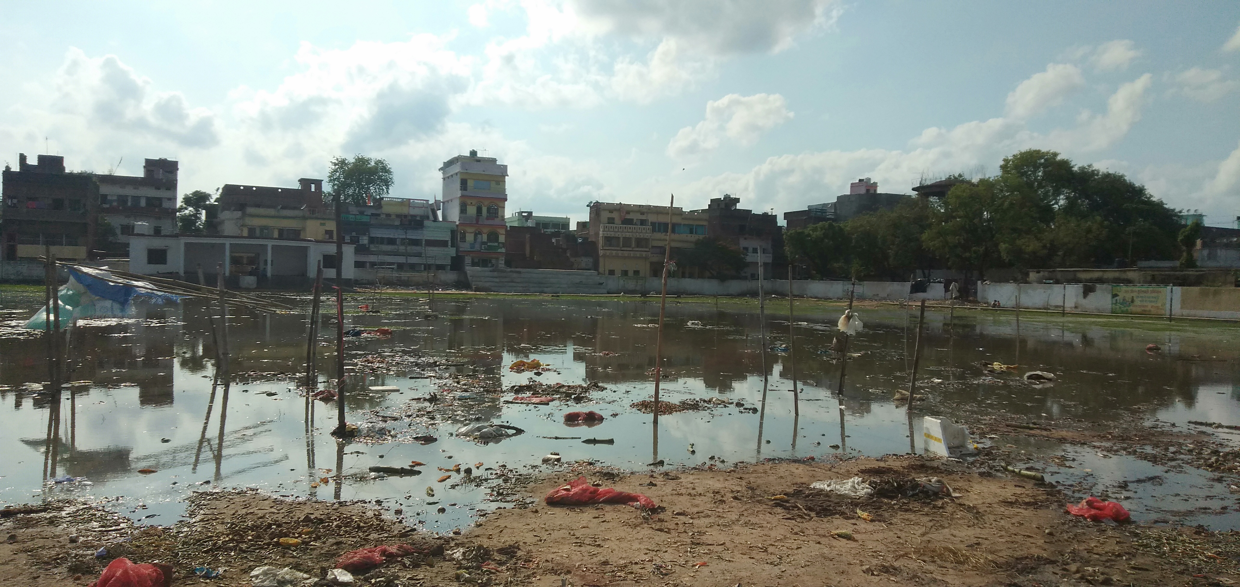 vegetable sellers are set up shop in vegetable market due to water logging in padav maidan