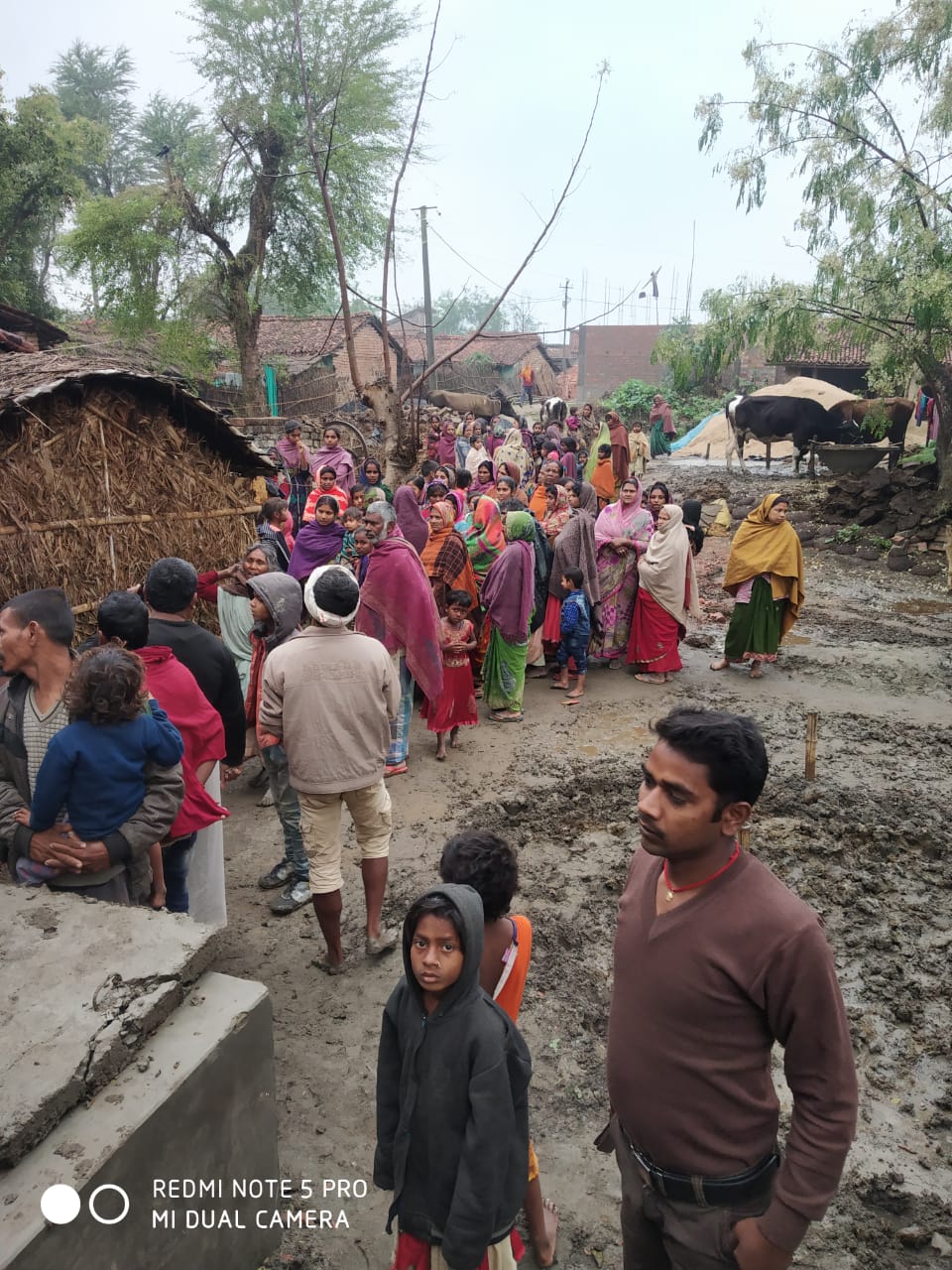Villagers gathered at deceased's house