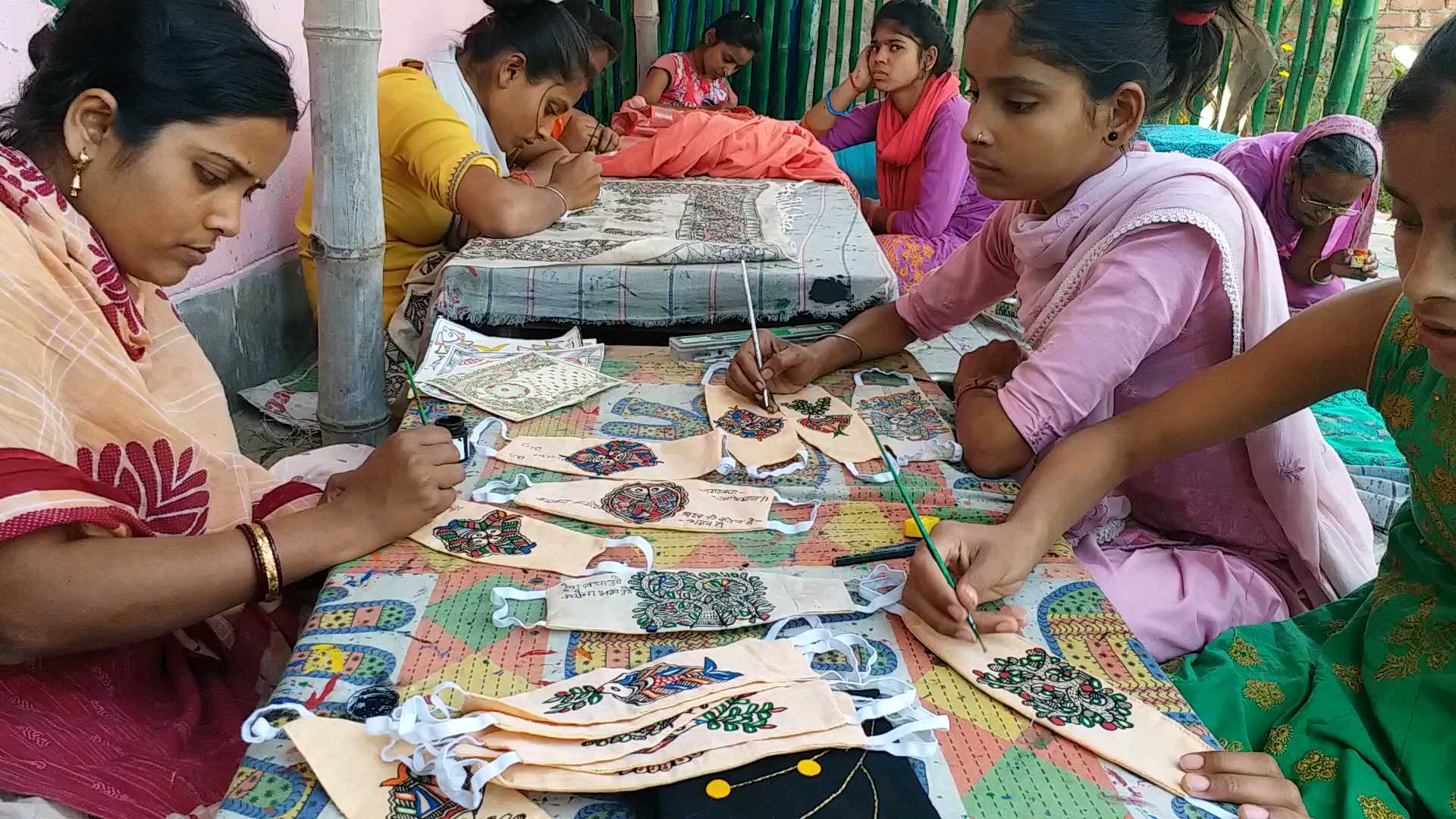 Trying to make people aware of the corona virus by mithila painting on masks