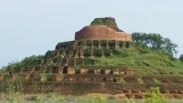 Buddhist Stupa surrounded by flood water in Motihari