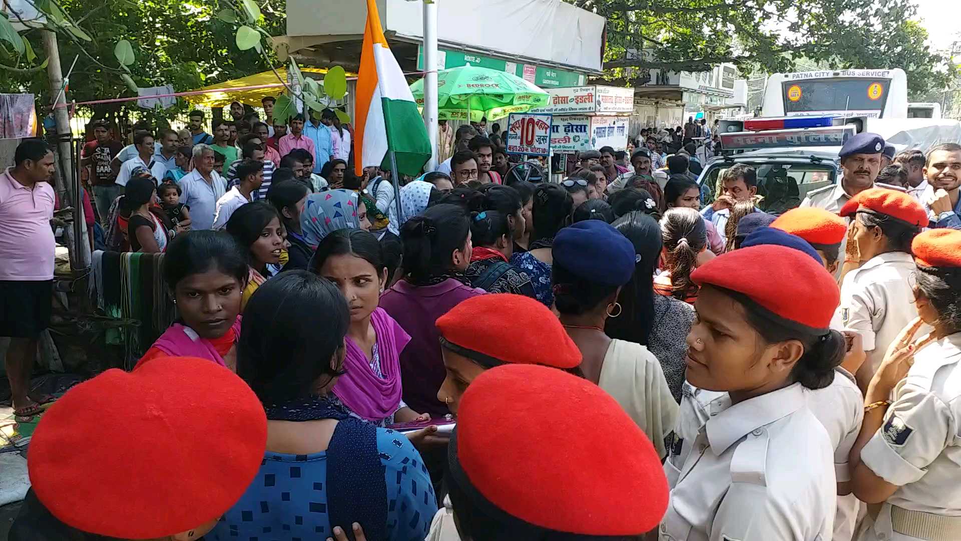 Women police demonstrators explaining to women