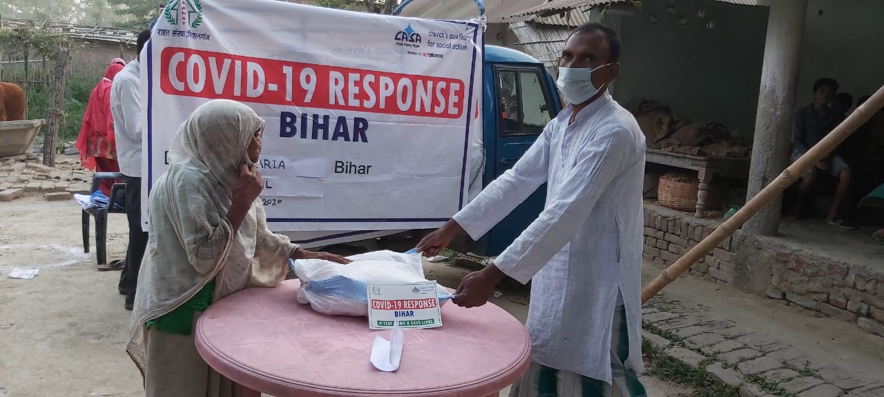 The masks were also distributed with ration to those in need