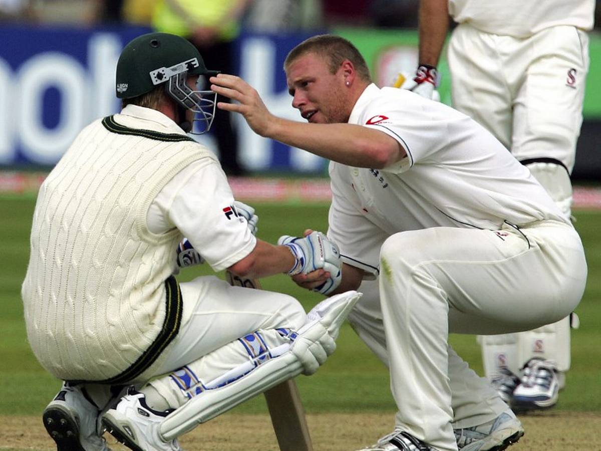 Andrew Flintoff consoles Brett Lee as Australia lost the Test.