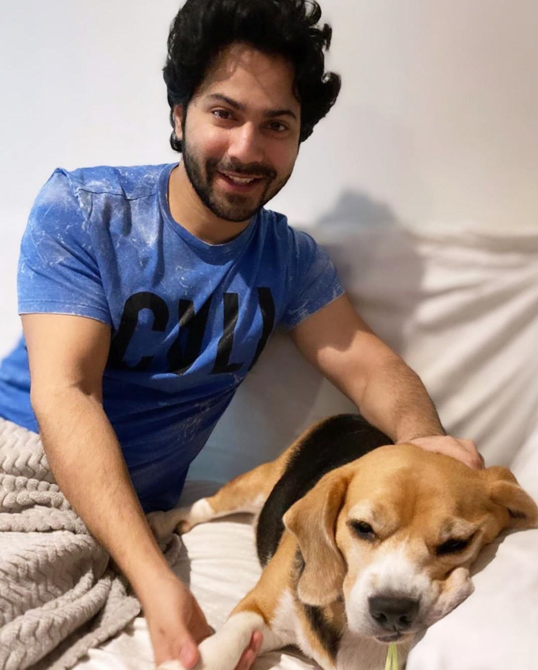 Varun Dhawan posts adorable snap with his puppy Angel