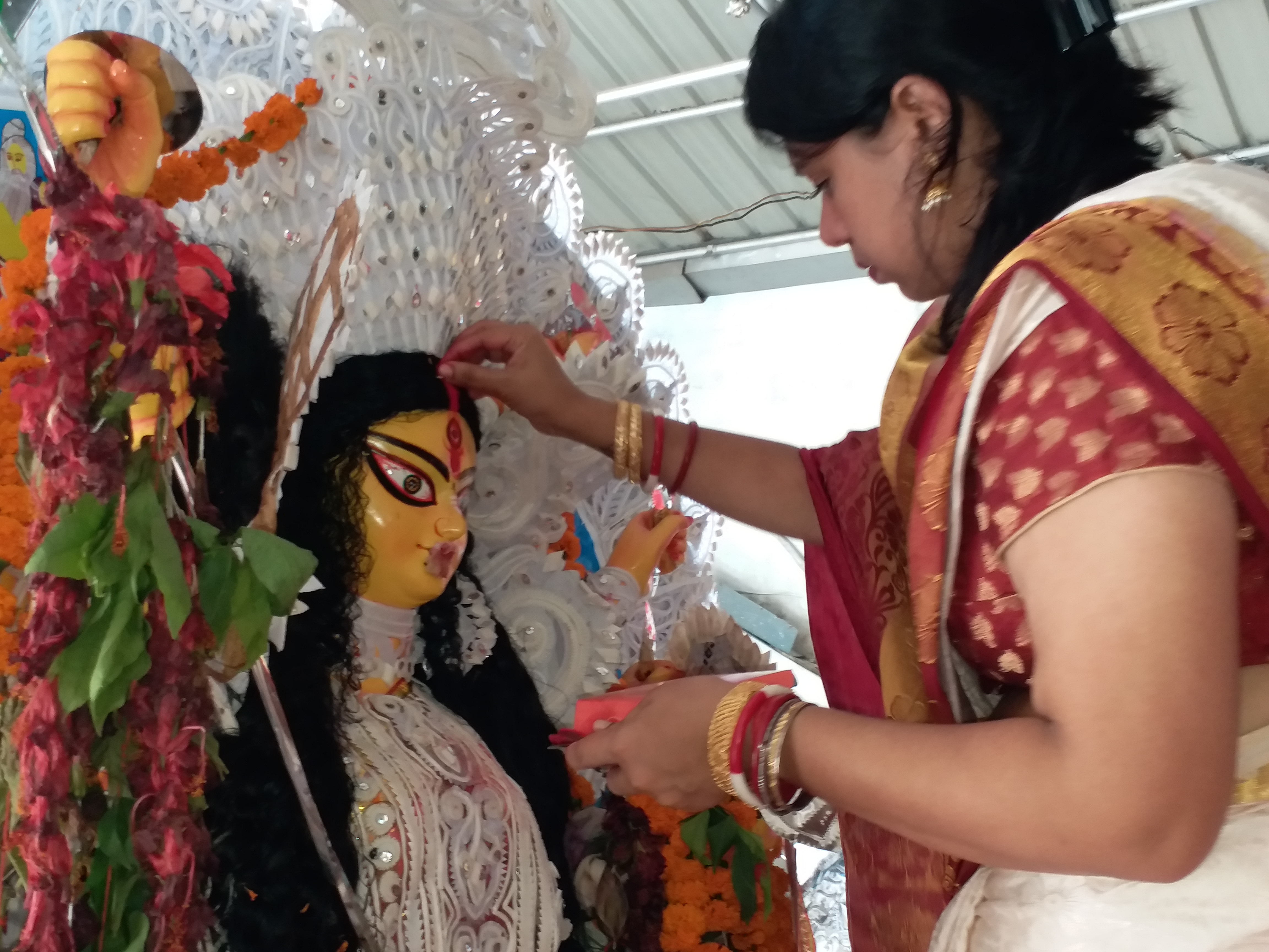 Played the tradition of playing vermilion with Maa Durga
