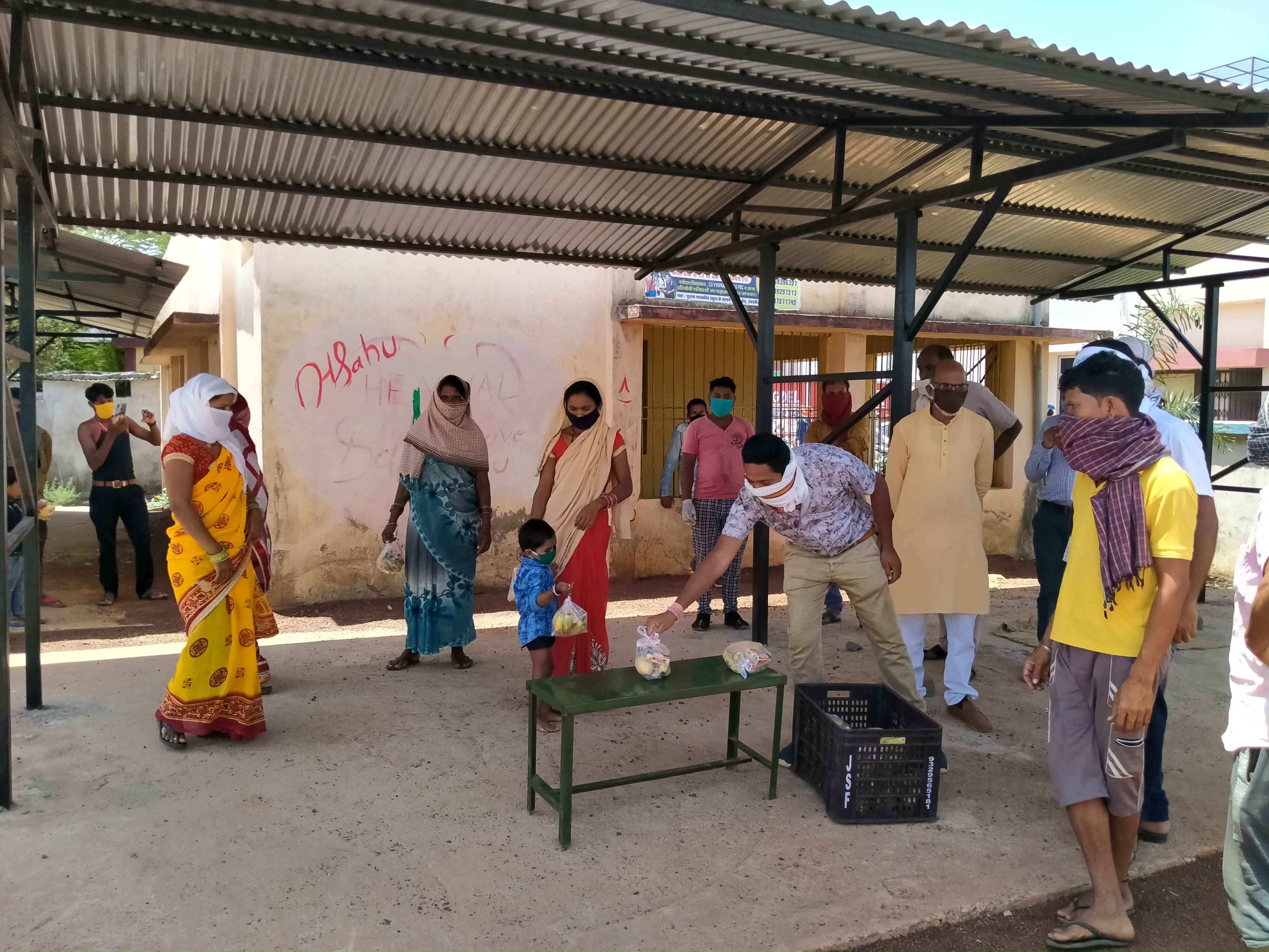 Congress leaders sharing fruits at Quarantine Center