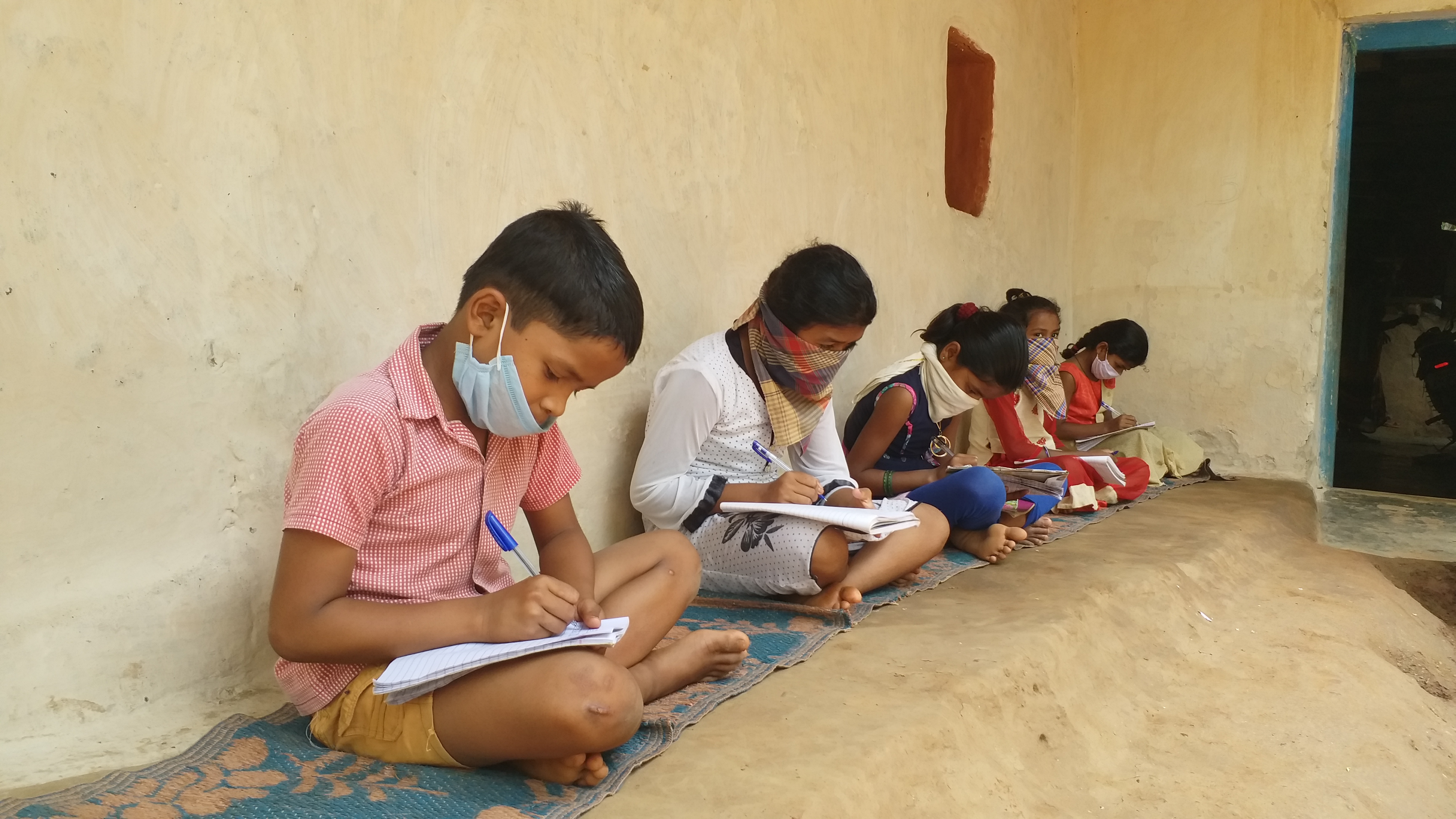 Children studying with loudspeaker