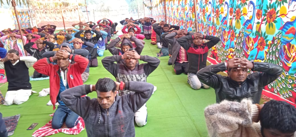 Members of Naxalite affected families doing yoga