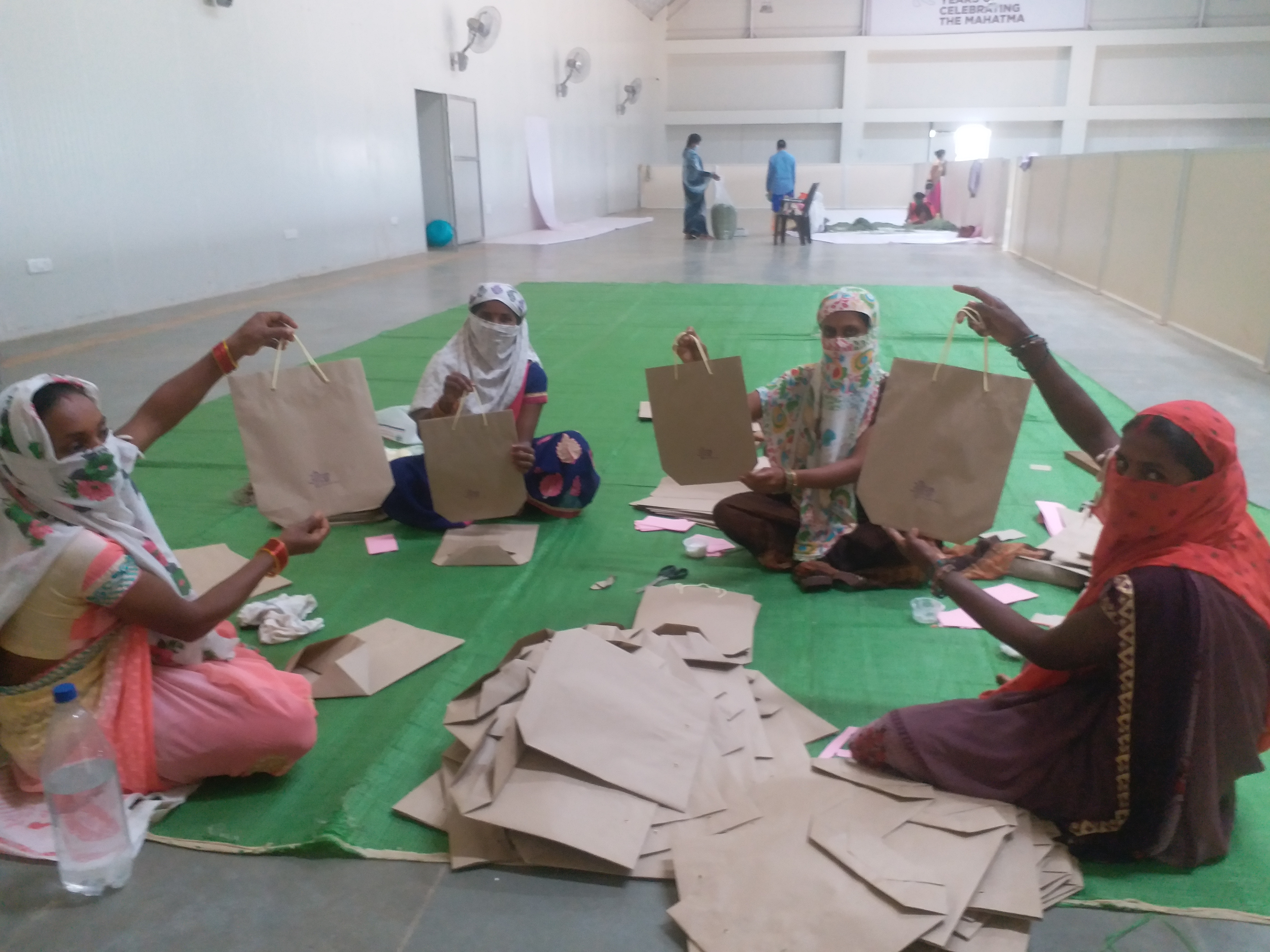 women making paper bags