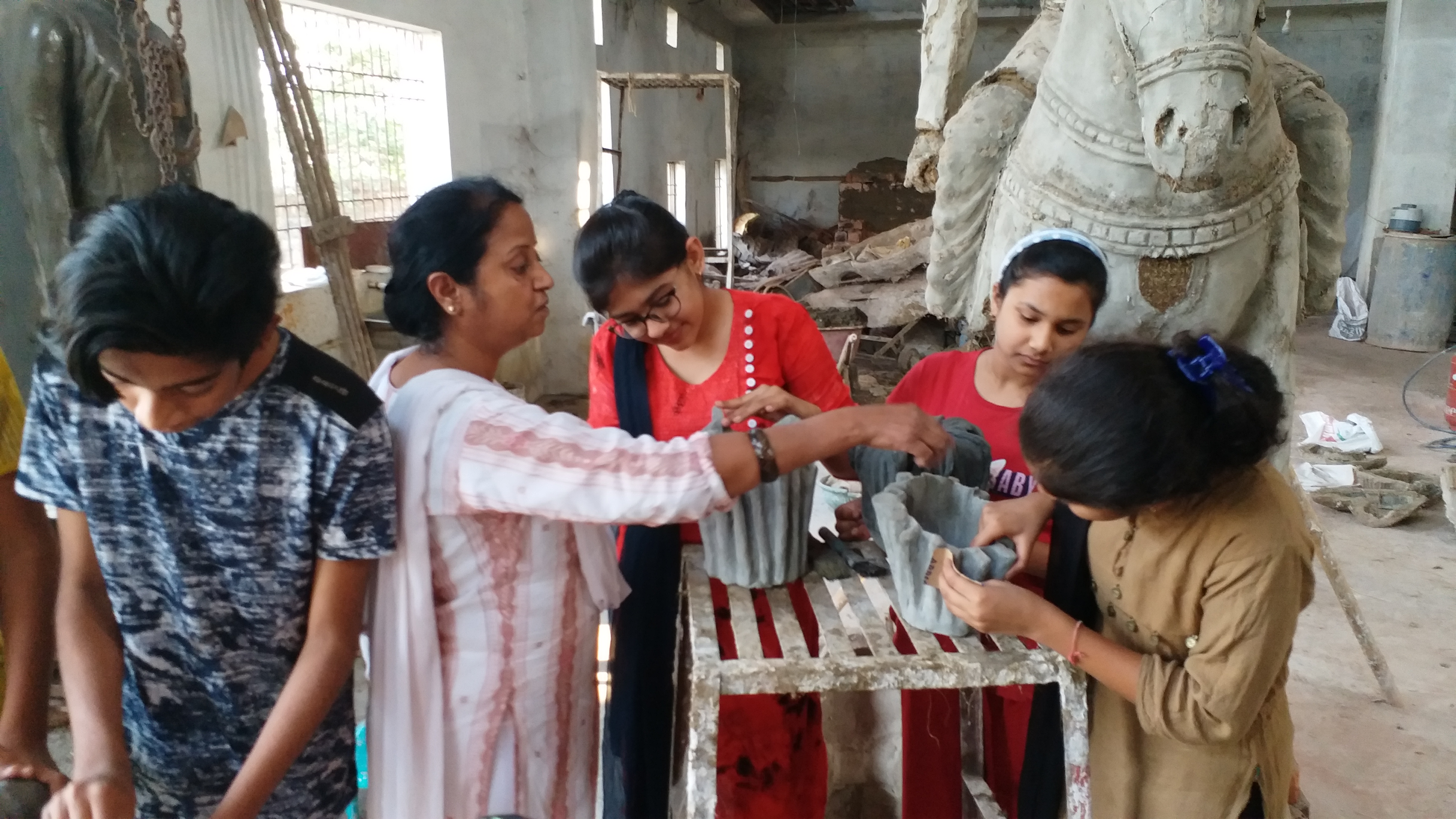 laxmi is giving training to children