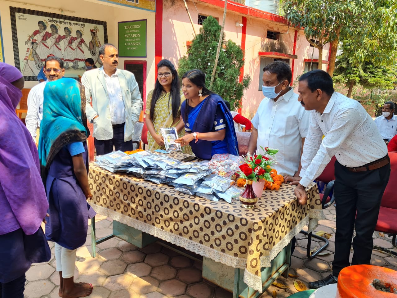 SDM presents sanitary pads to adolescent girls on International Womens Day in jashpur