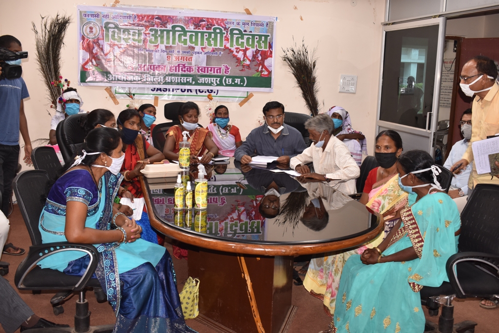 CM Bhupesh Baghel talks to women making sanitizer from Mahua in jashpur