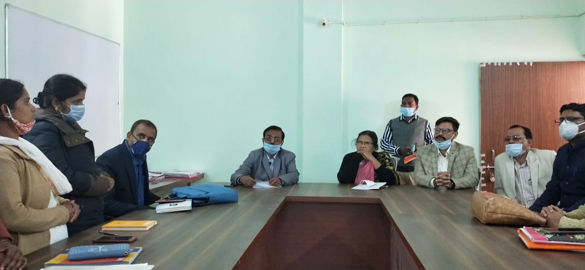 The commissioner inspected the English medium school