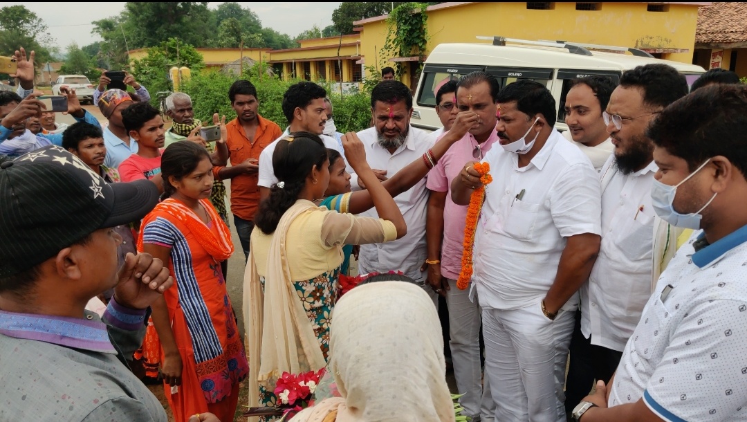 Villagers welcoming MLA