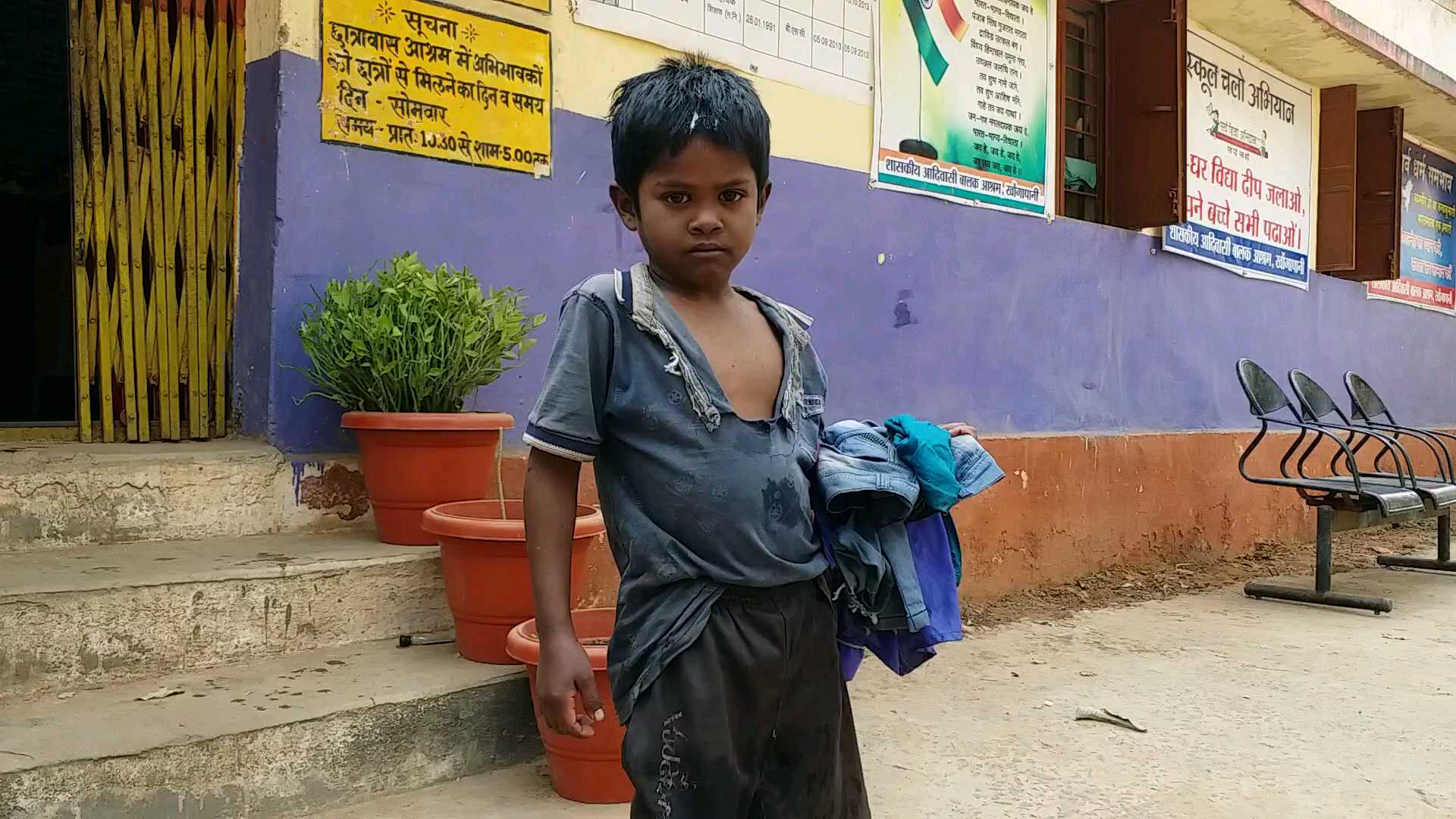 Children are wearing torn clothes in Khongapani Boys Hostel