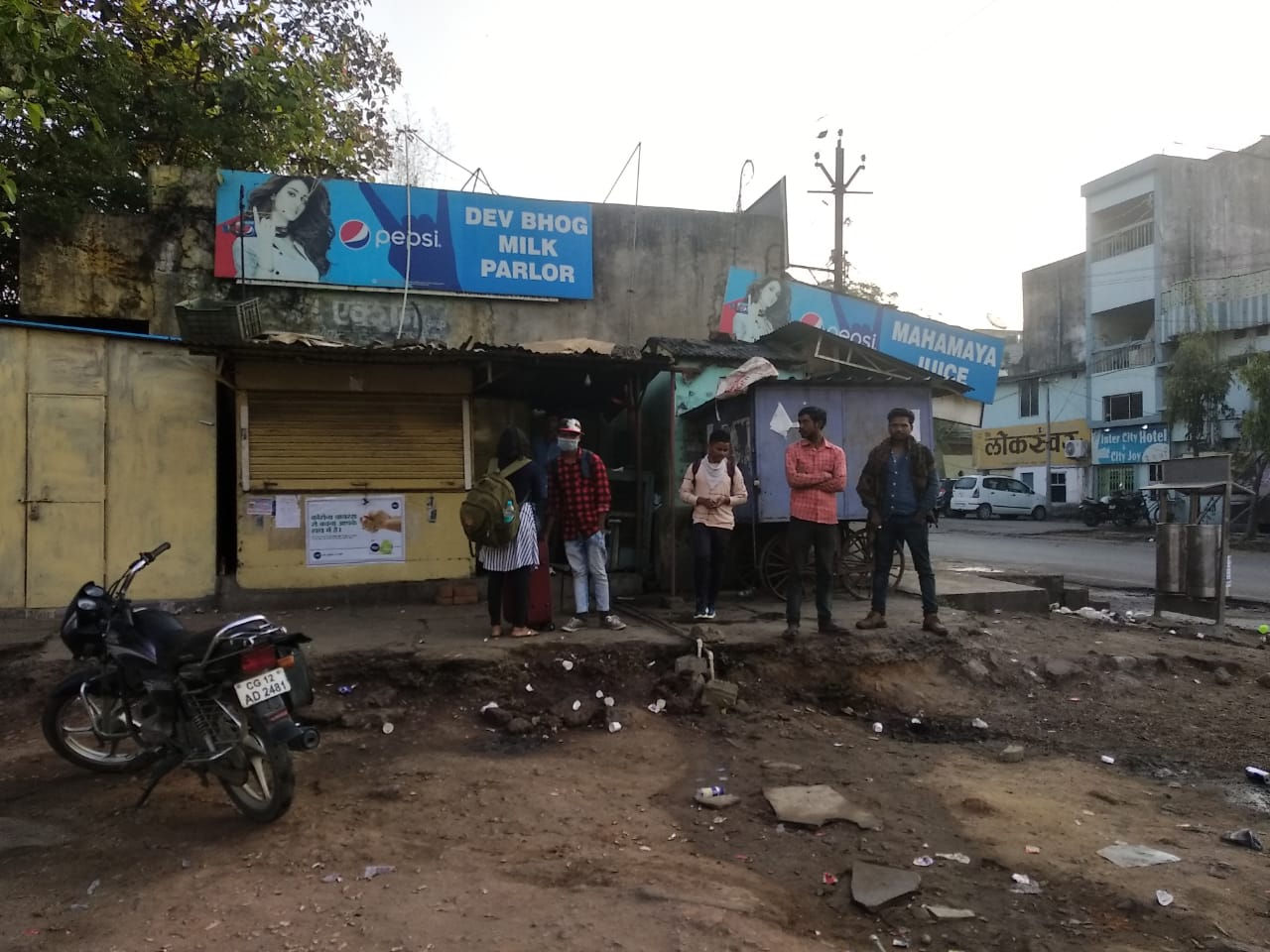 People arrive at bus stand late at night all  transport are canceled