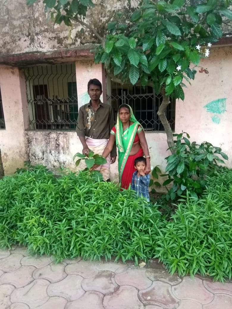 Migrant laborers plant sapling