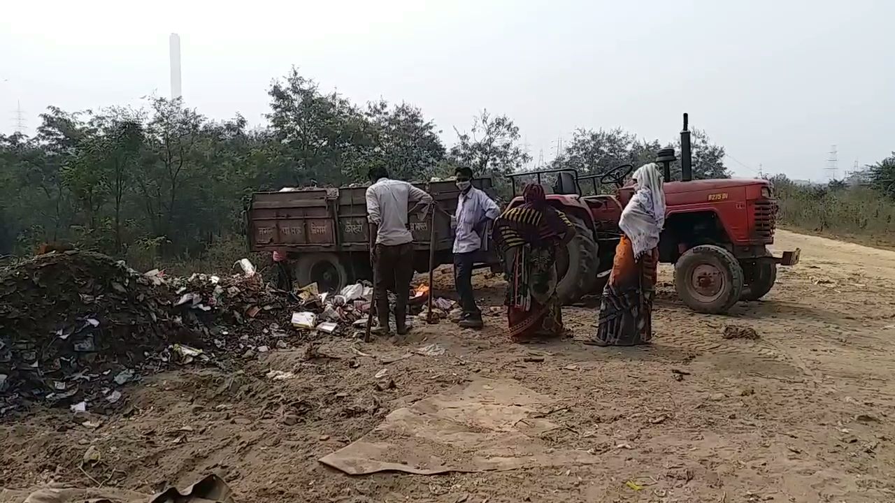 contractors dumping garbage in the open area