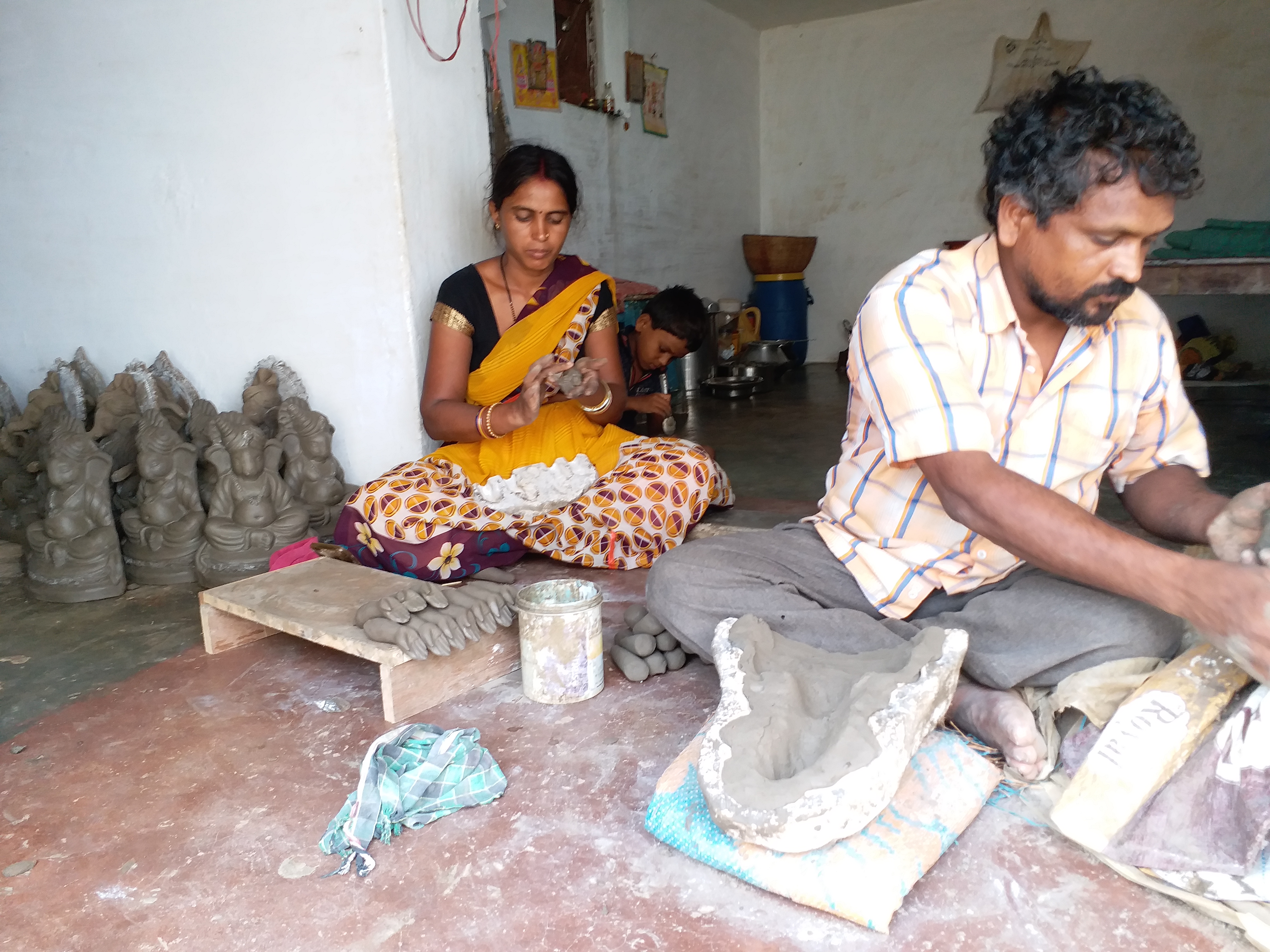 Sculptor making sculpture