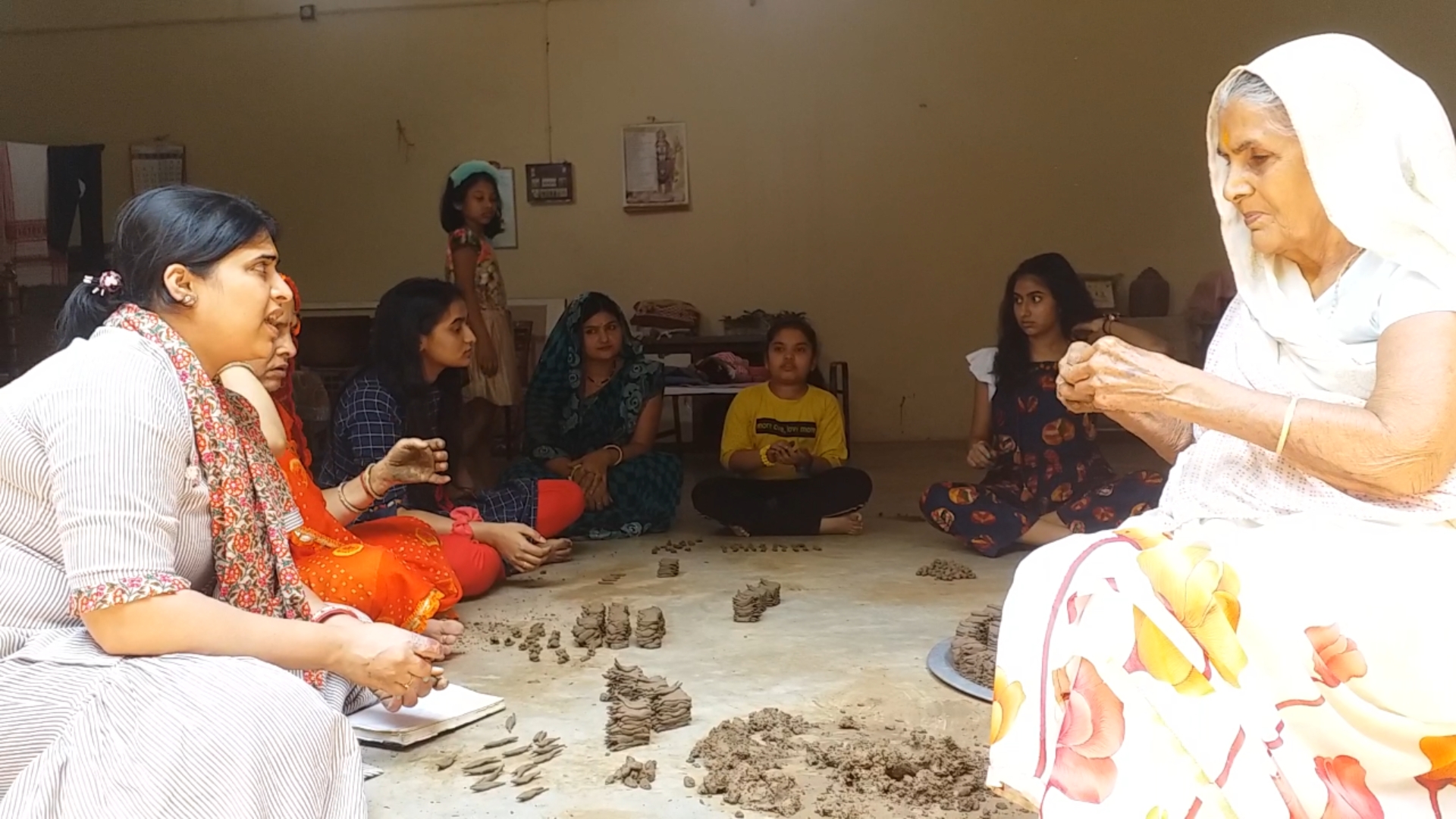 Women building Shivling