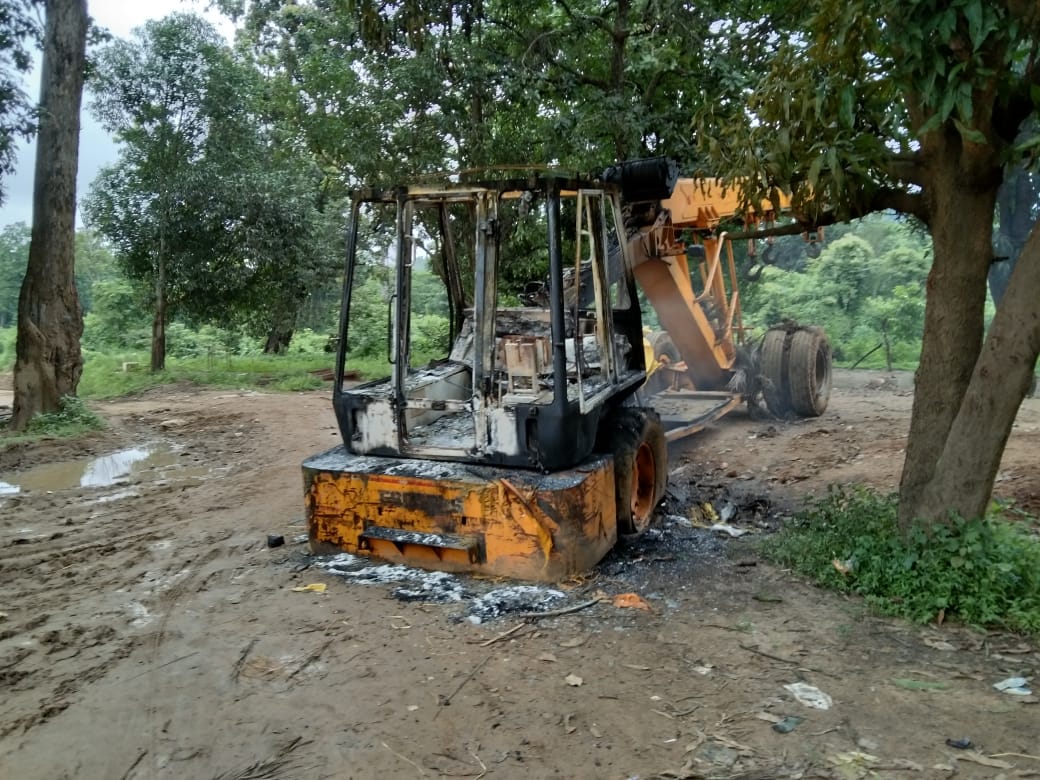 naxal set fire on JCB