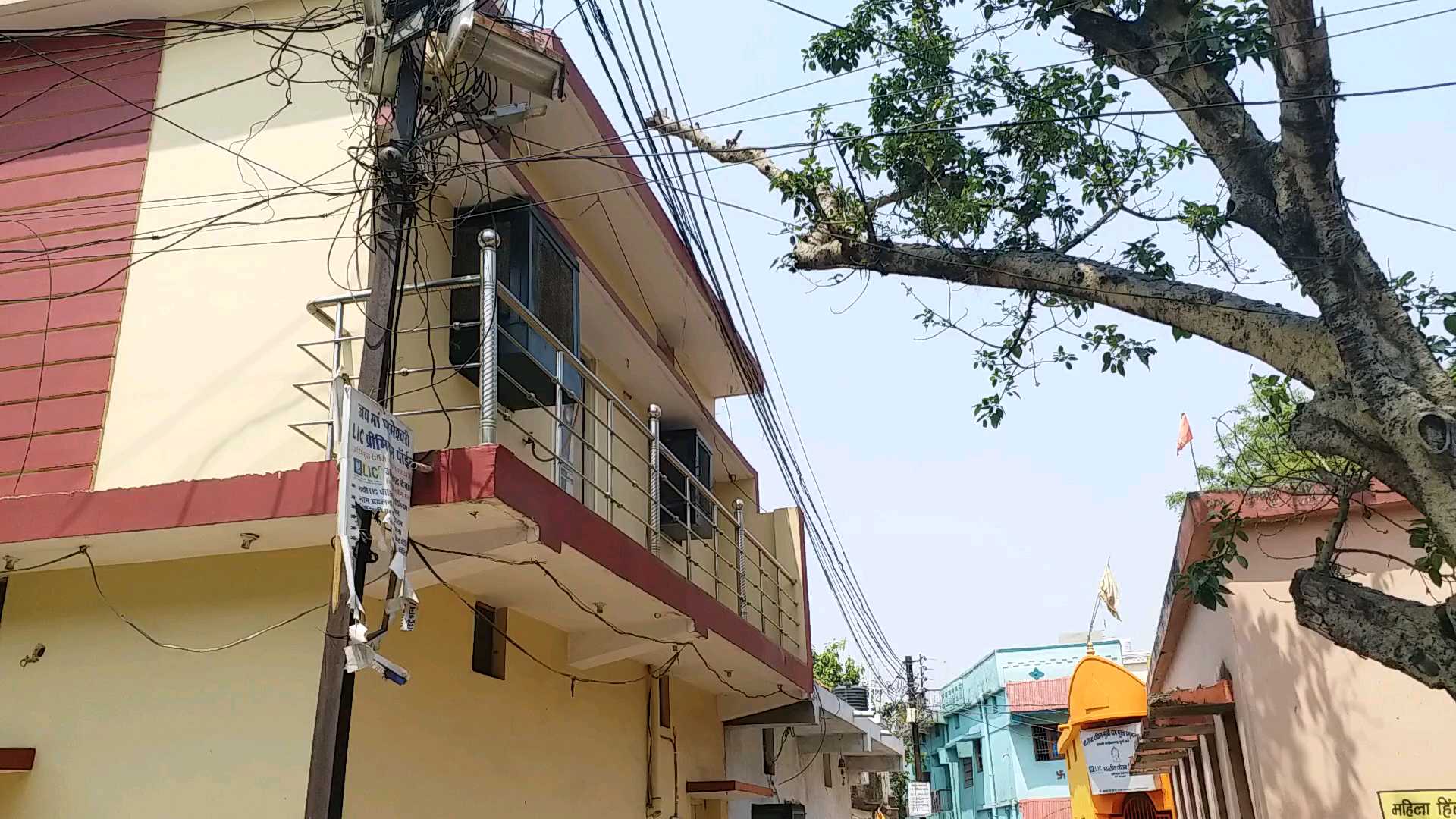 high voltage line passing near houses