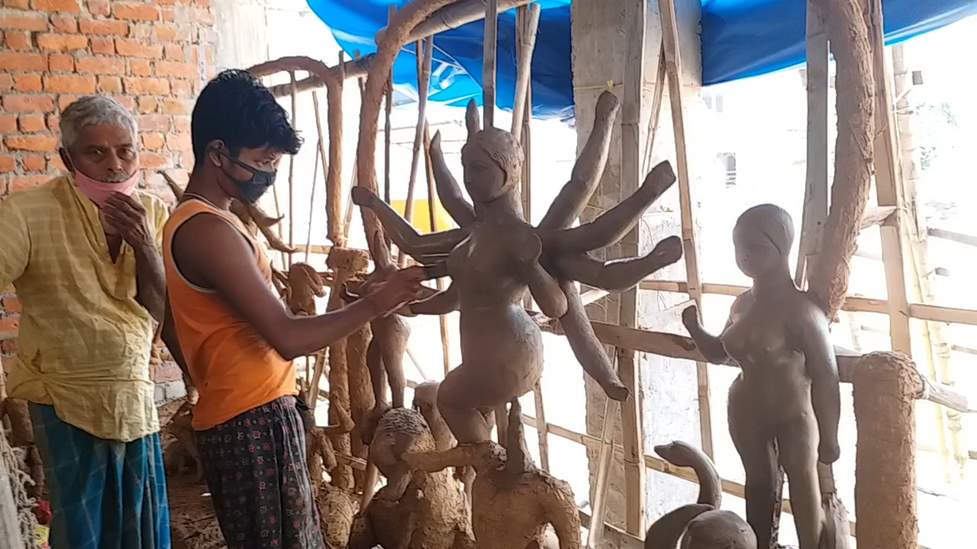 Sculptor making Durga statue in Navratri