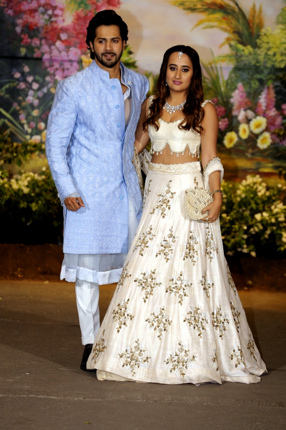 Varun Dhawan with Natasha Dalal at Sonam Kapoor and Anand Ahuja's wedding reception in 2018