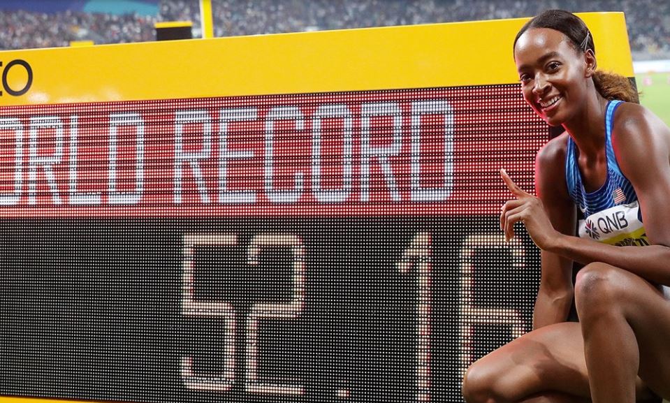 Dalilah Muhammad poses with her world 400m hurdles record of 52.16