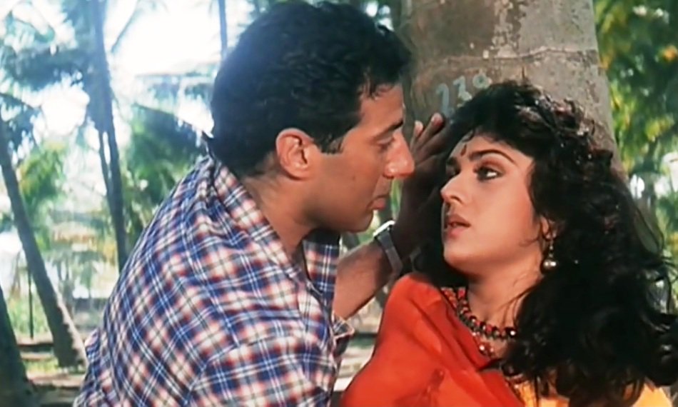 Meenakshi with Sunny Deol in a still from Ghatak