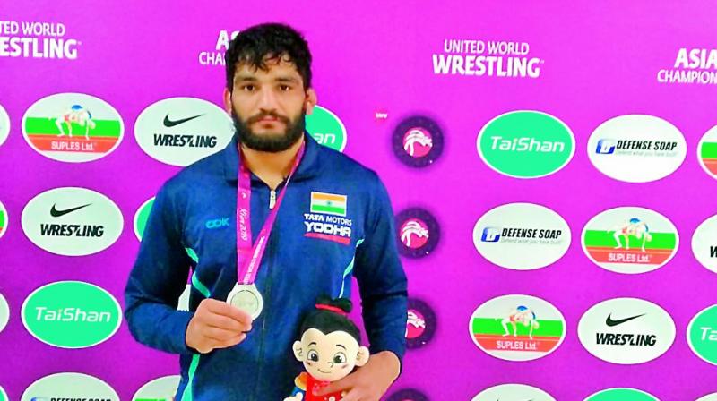 Sunil, Gurpreet, win, silver, Asian Wrestling