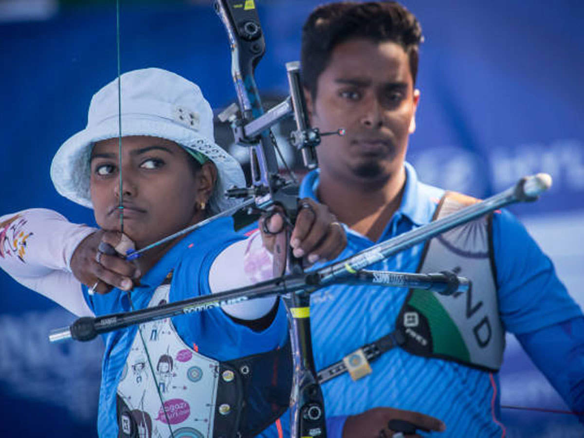 India women's recurve archer Deepika Kumari on target as his archer husband Atanu Das looks on.