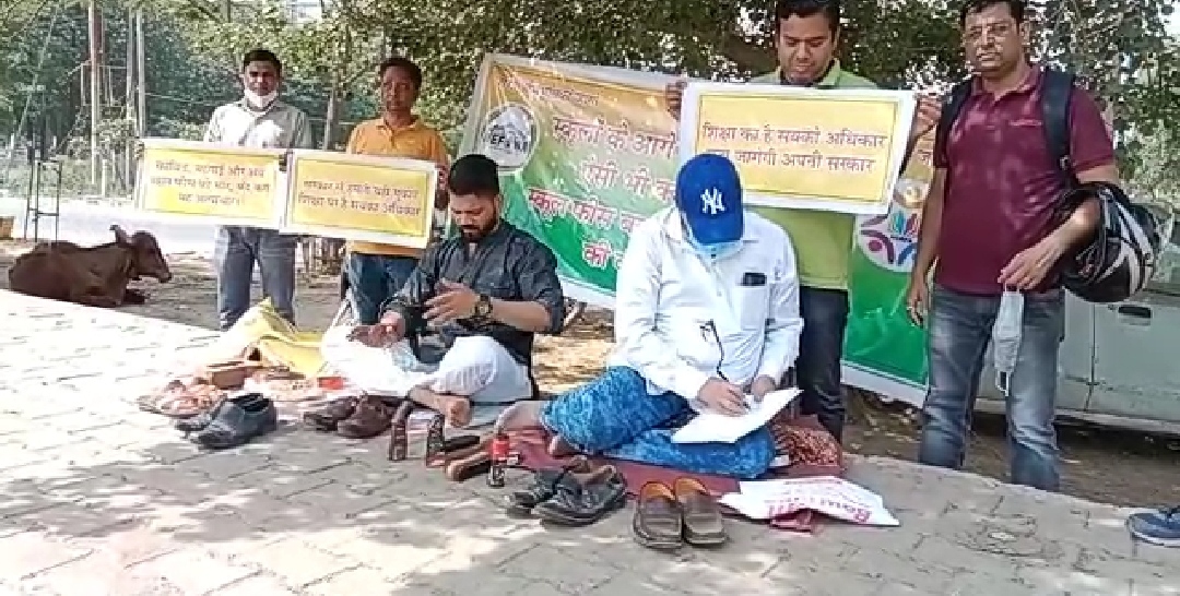 Parents protest against fee hike by polishing shoes in Greater Noida