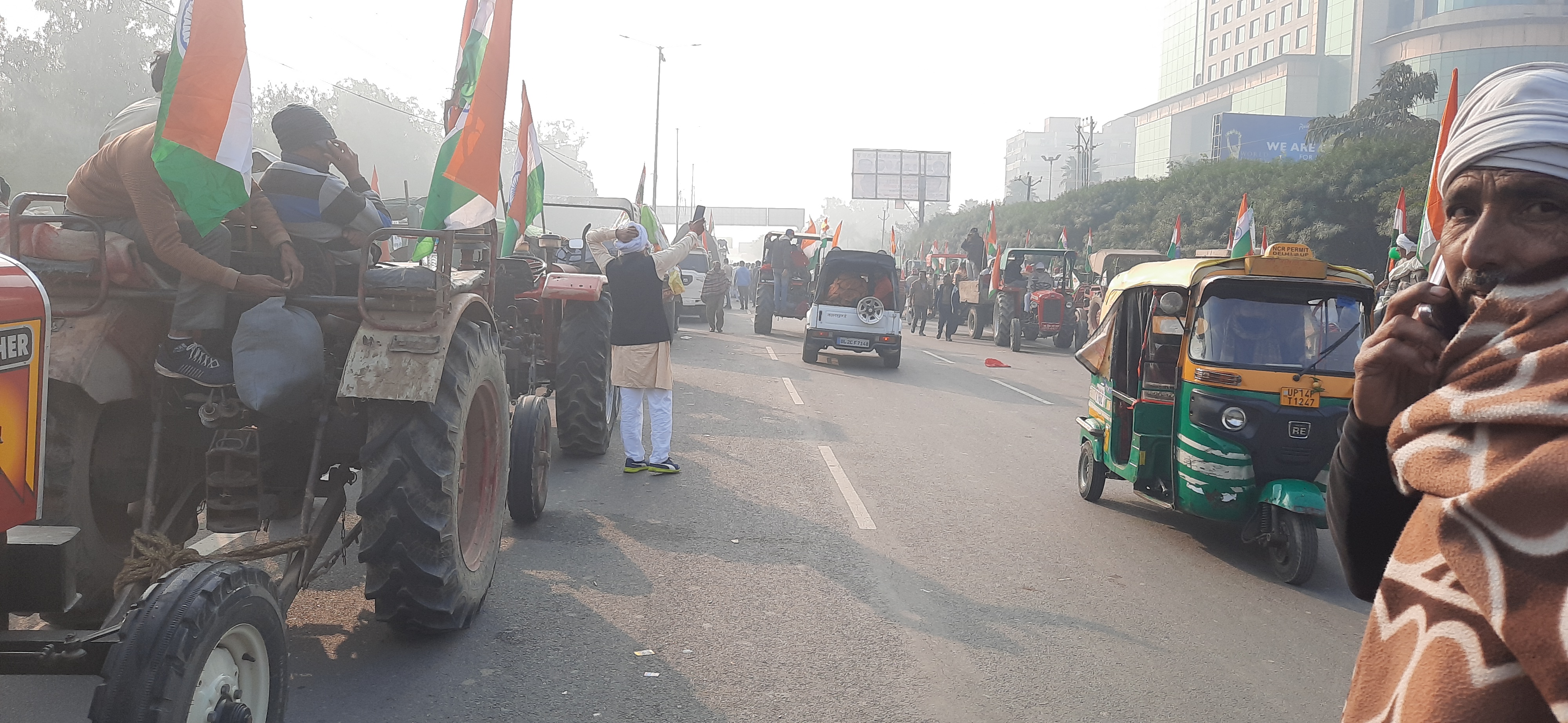 several kilometers of long lines of tractors along  Ghazipur border