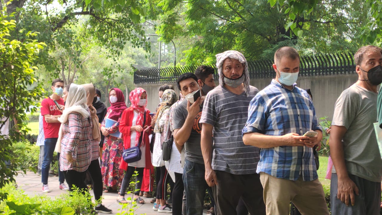 afghan refugees gather outside of australian embassy in delhi