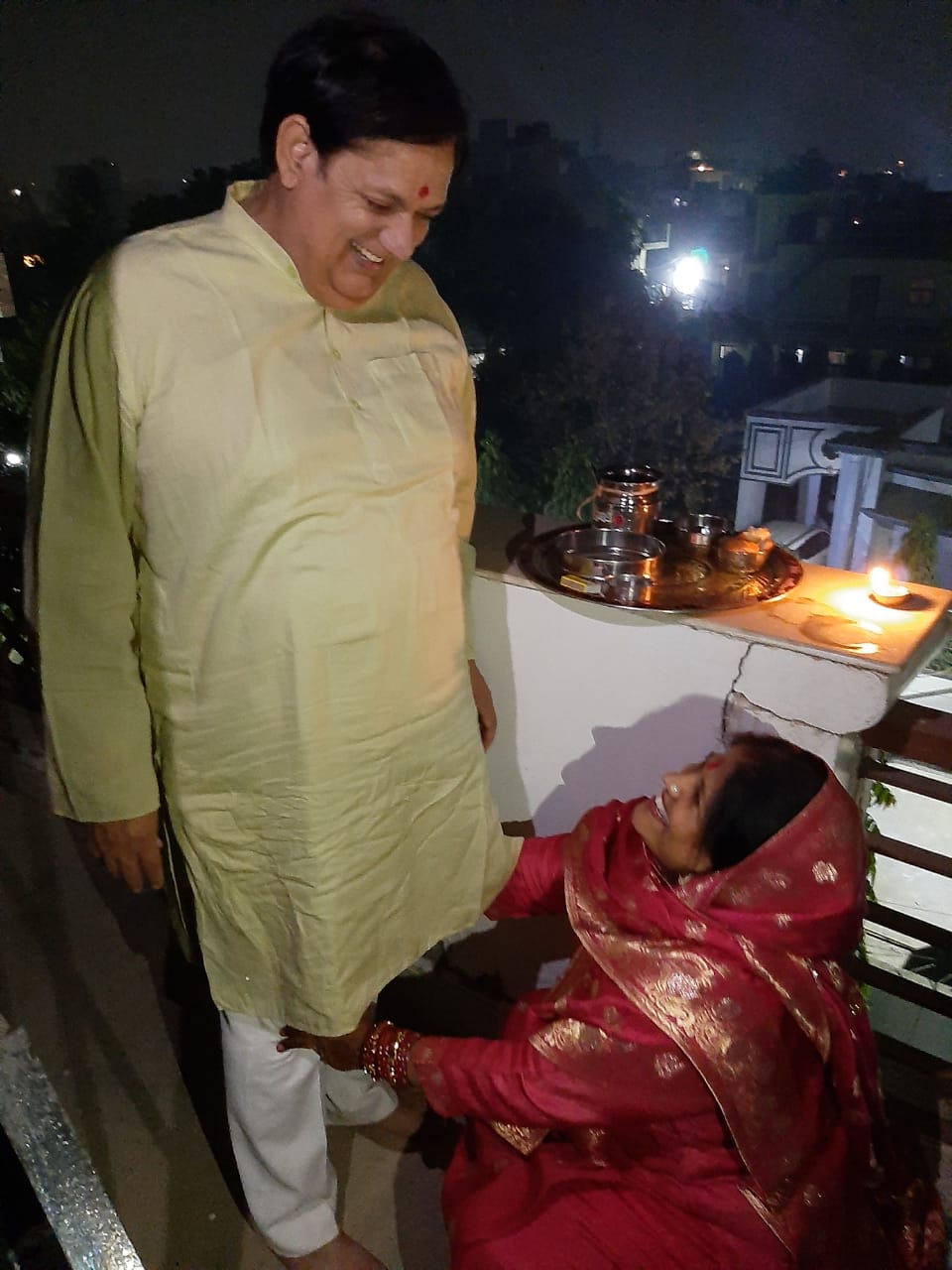 Fasting lady worshiping Karva Chauth