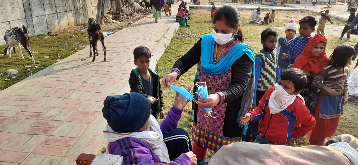 Sanitizer and mask distributed with awareness of covid19 in chhawla delhi