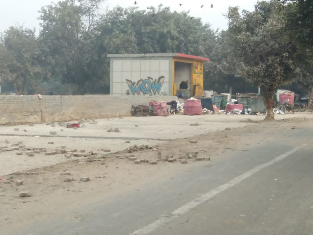 Broken boundary of the park and stone work started in dwarka