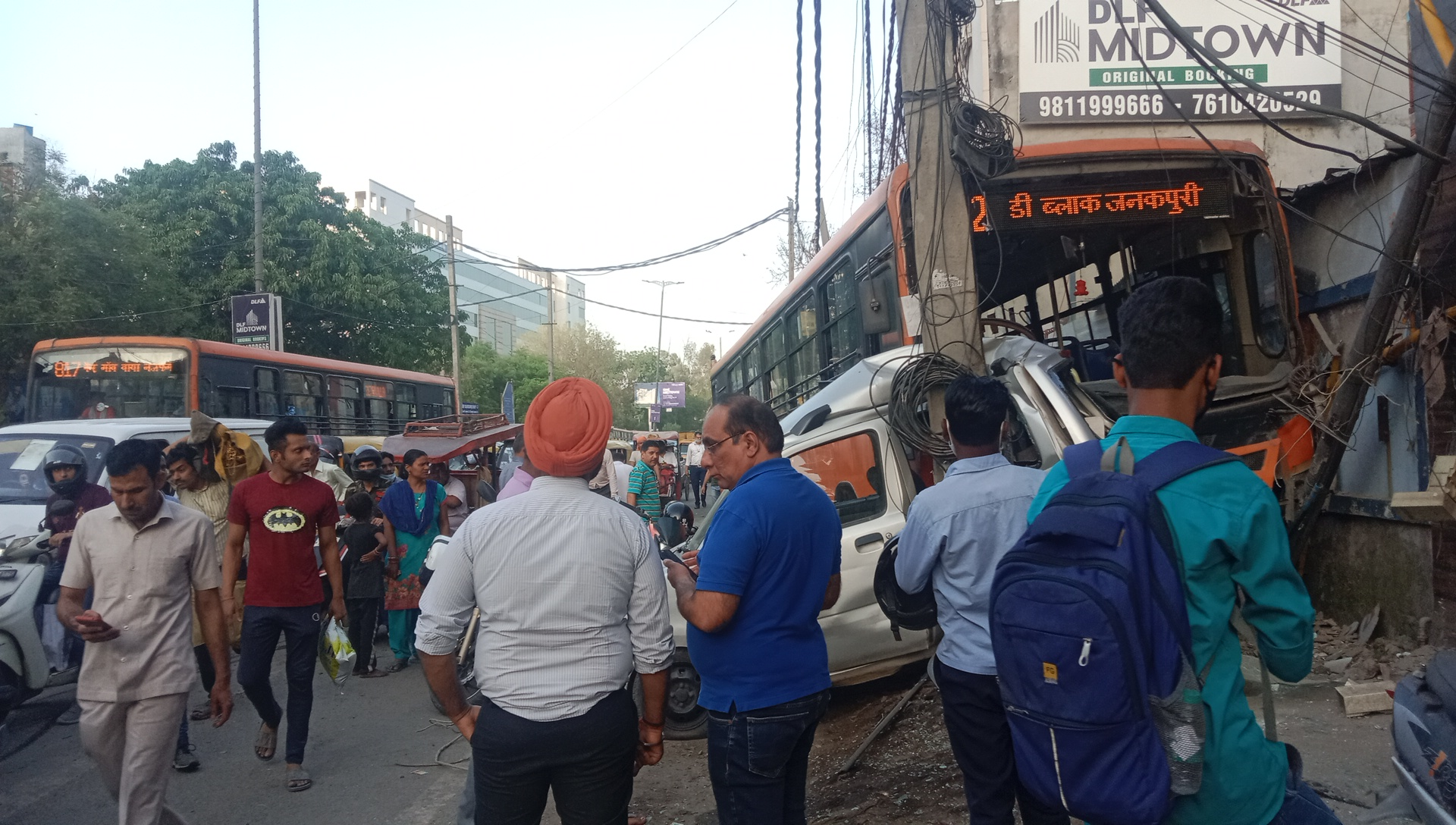 Cluster bus hit car on Najafgarh road