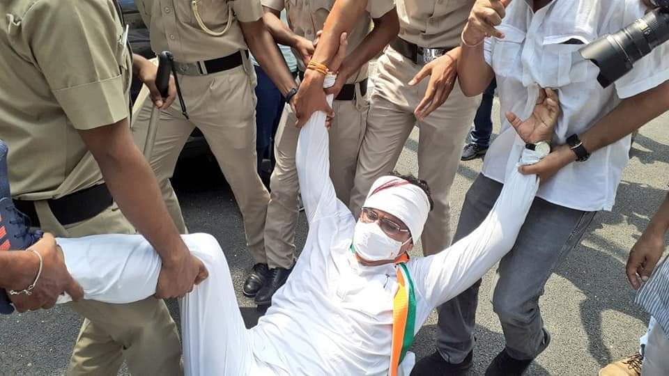 protest outside parliament against the farmers' bill