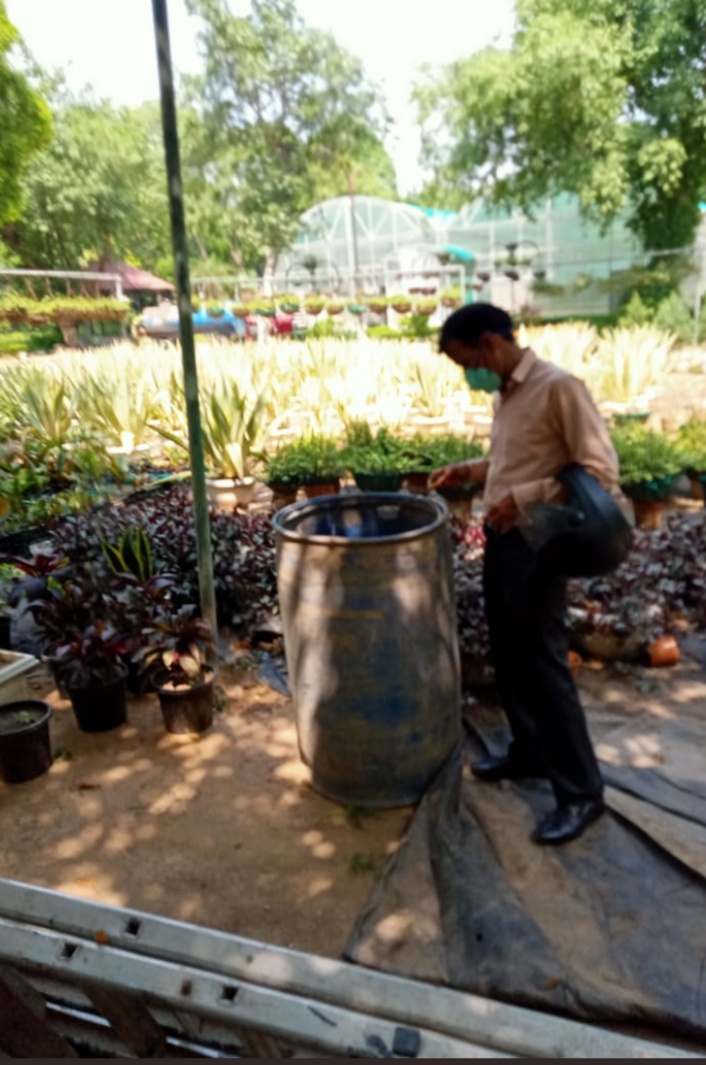 Spraying chemicals in water tank