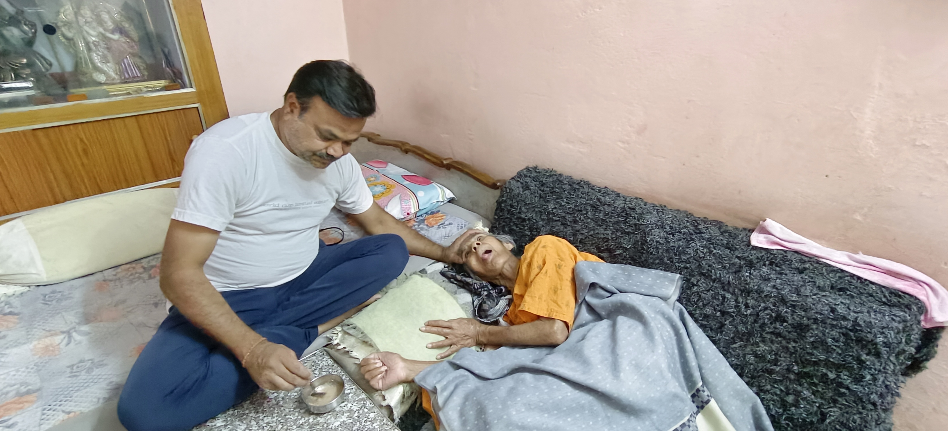 Rajesh serving his mother in Chhatarpur