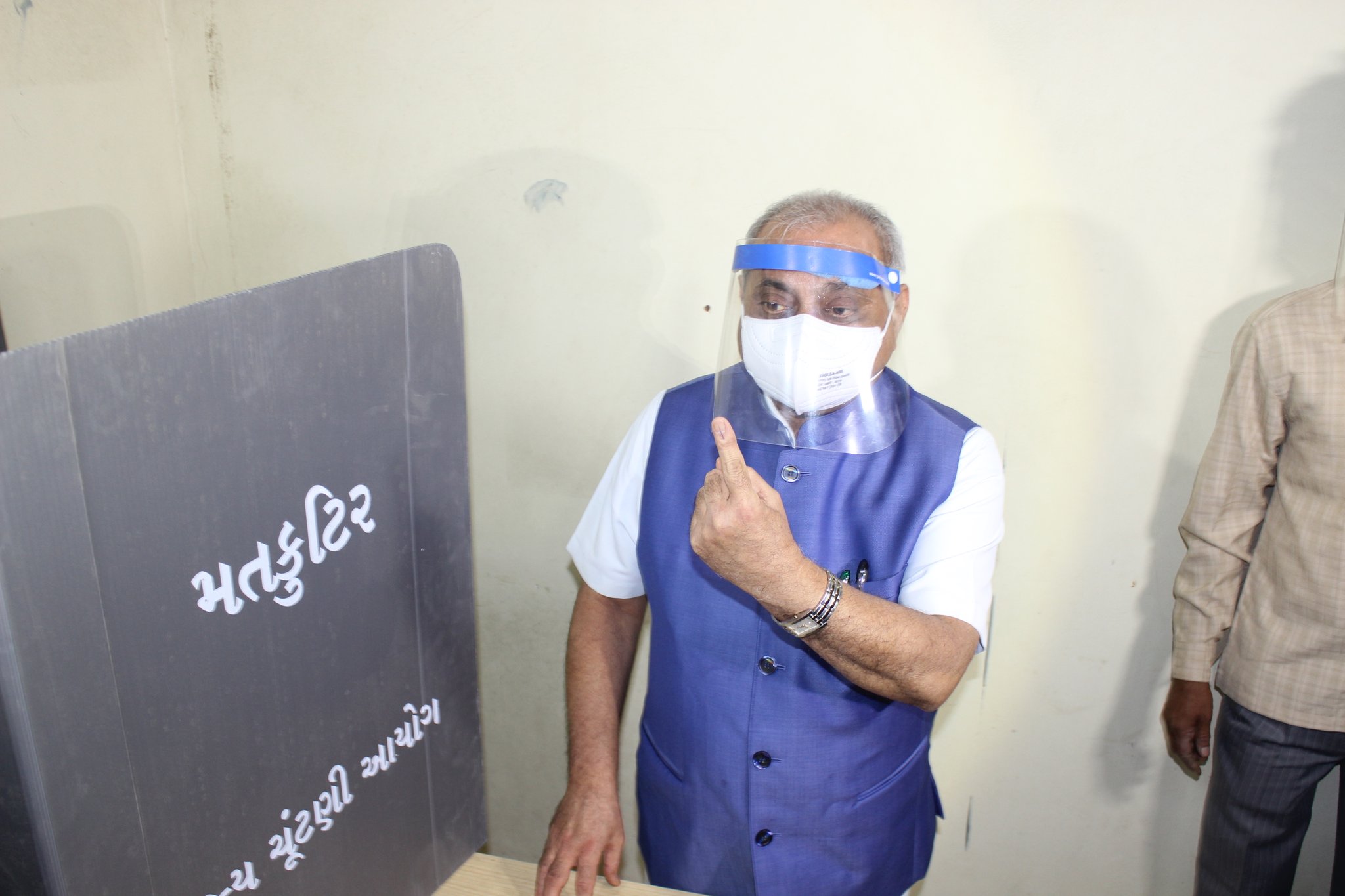 Senior citizen casting her vote in Gujarat