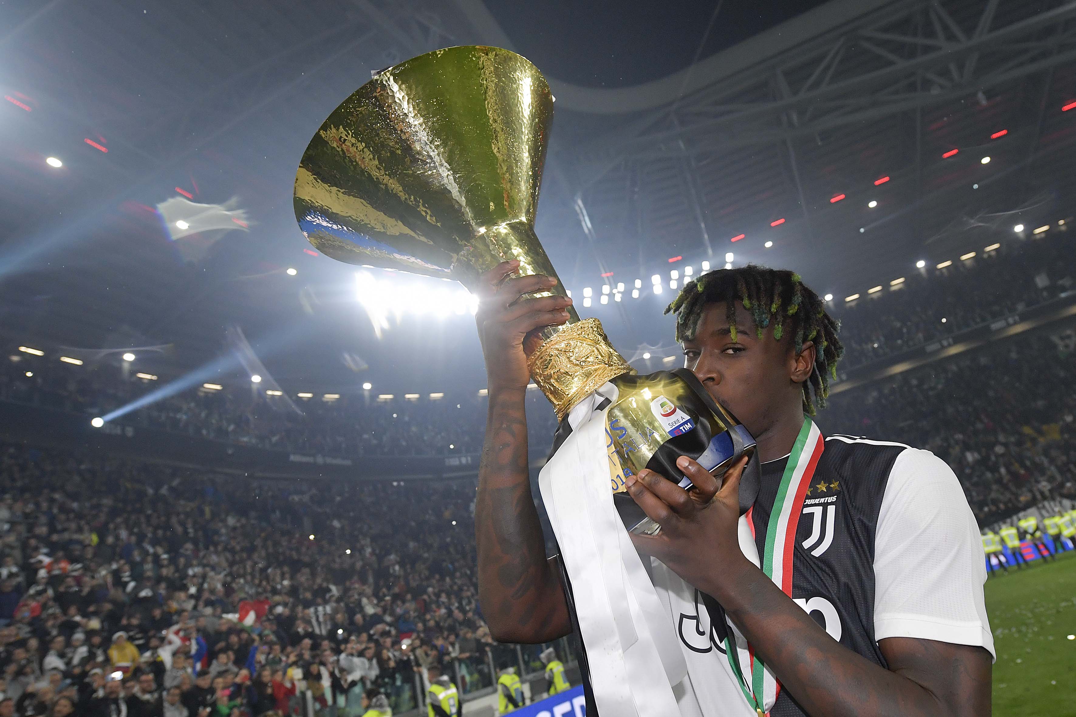 Moise Kean with the Serie A title.