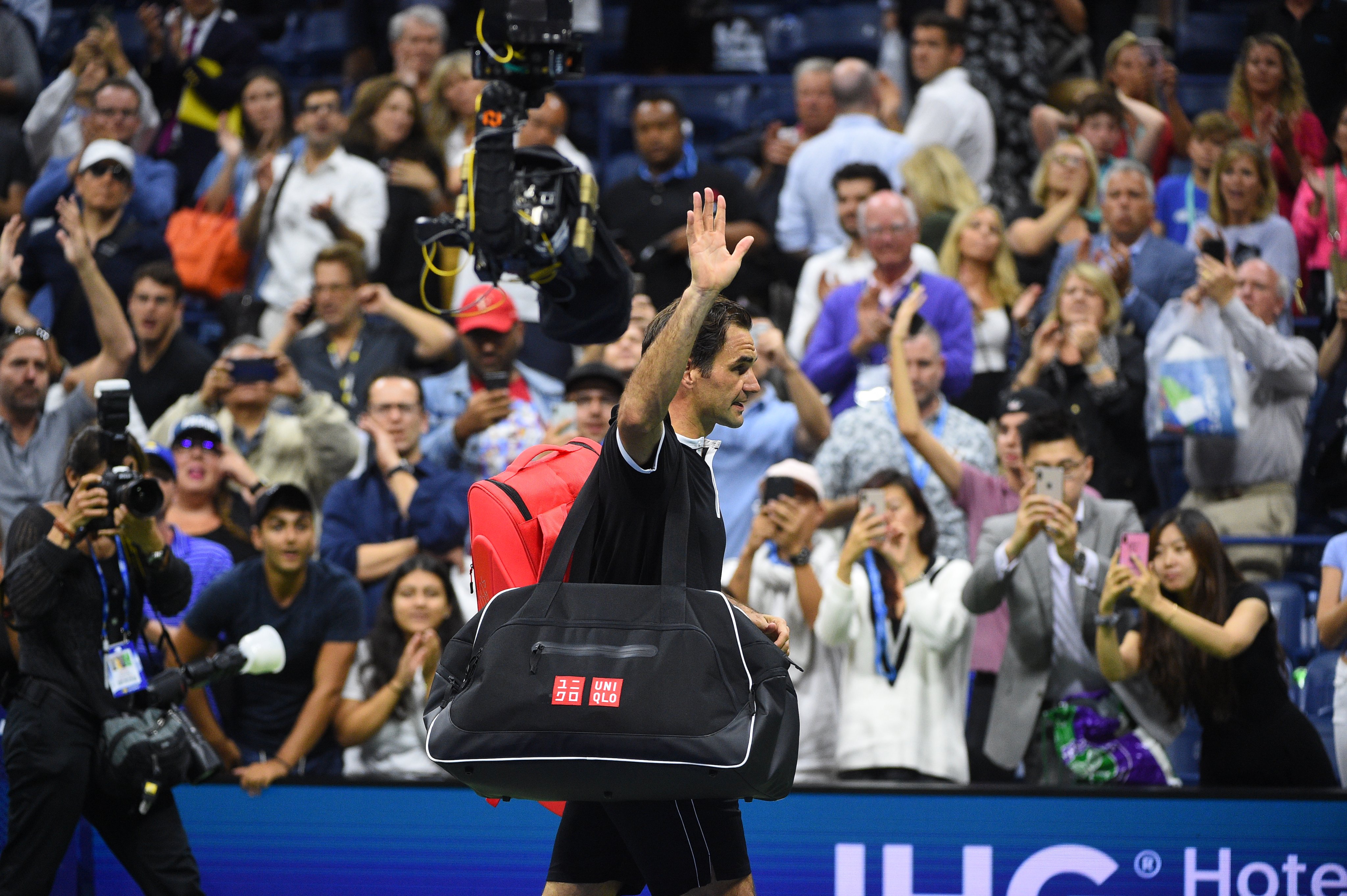 Roger Federer makes shock US Open exit after losing to Grigor Dimitrov in quarters.